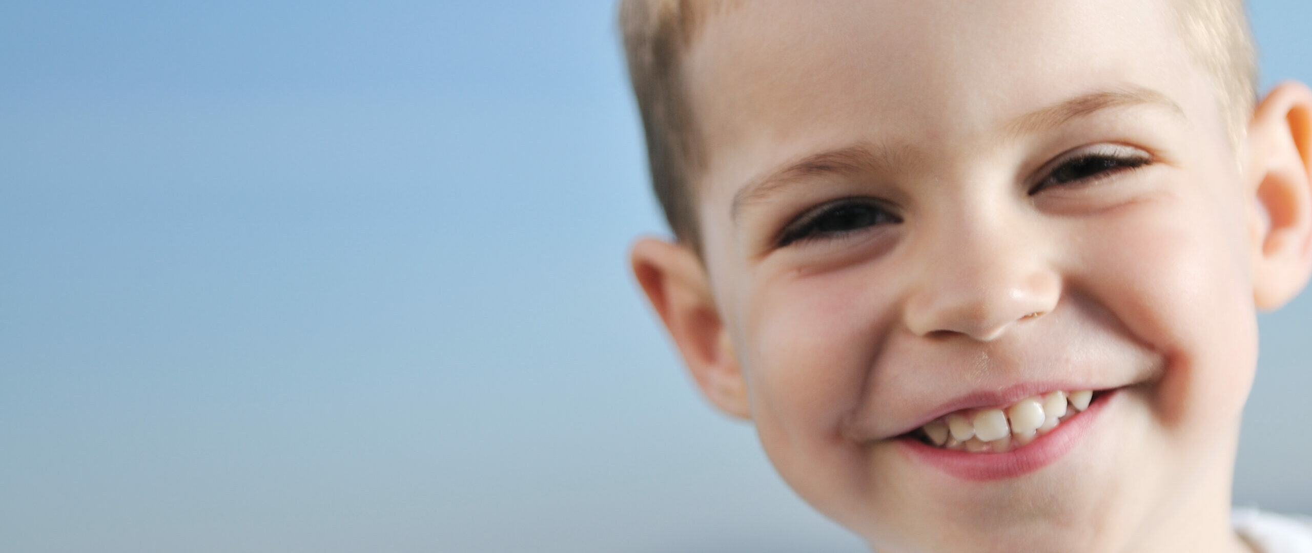 happy young boy child outdoor portrait