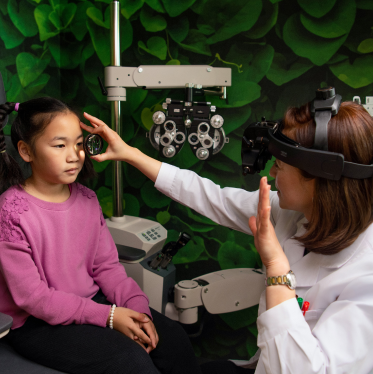 doctor-taking-an-eye-exam-with-patient