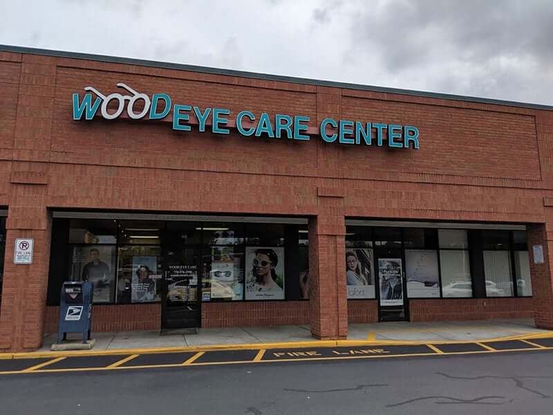 The storefront of Wood Eye Care Center clinic, your trusted Treehouse Eyes provider in Lawrenceville, GA.