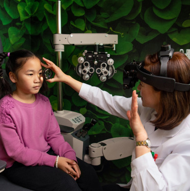 doctor-taking-an-eye-exam-with-patient