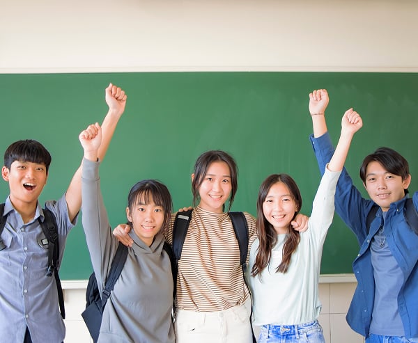 A group of happy, diverse children with healthy vision after successful myopia treatment in La Jolla, CA.