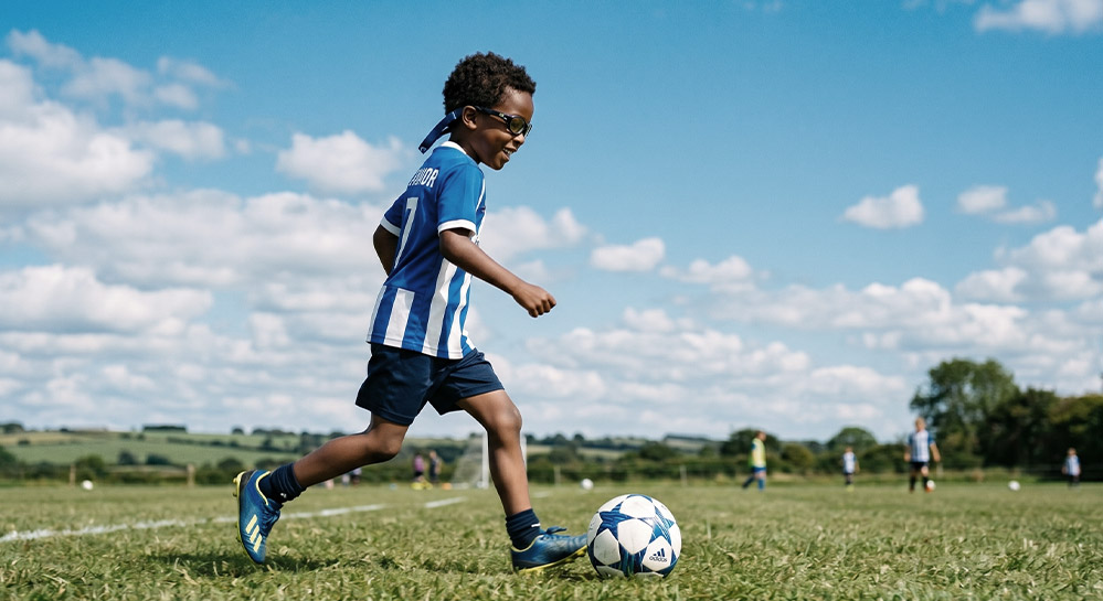 African-american-Boy-playing-sports-with-increasing-Myopia-prescription