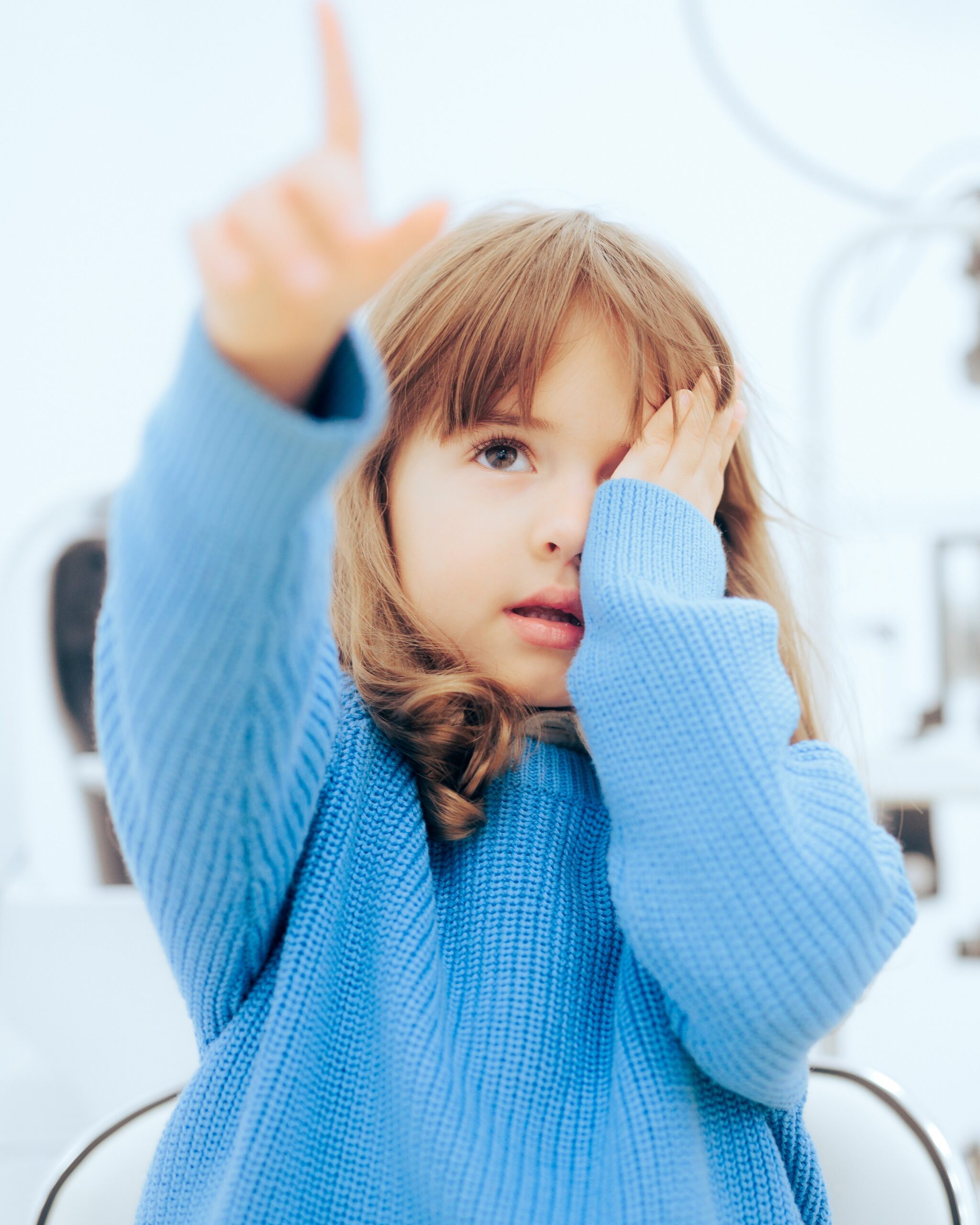 Cute Little Girl Covering One Eye During Ophthalmological Consult